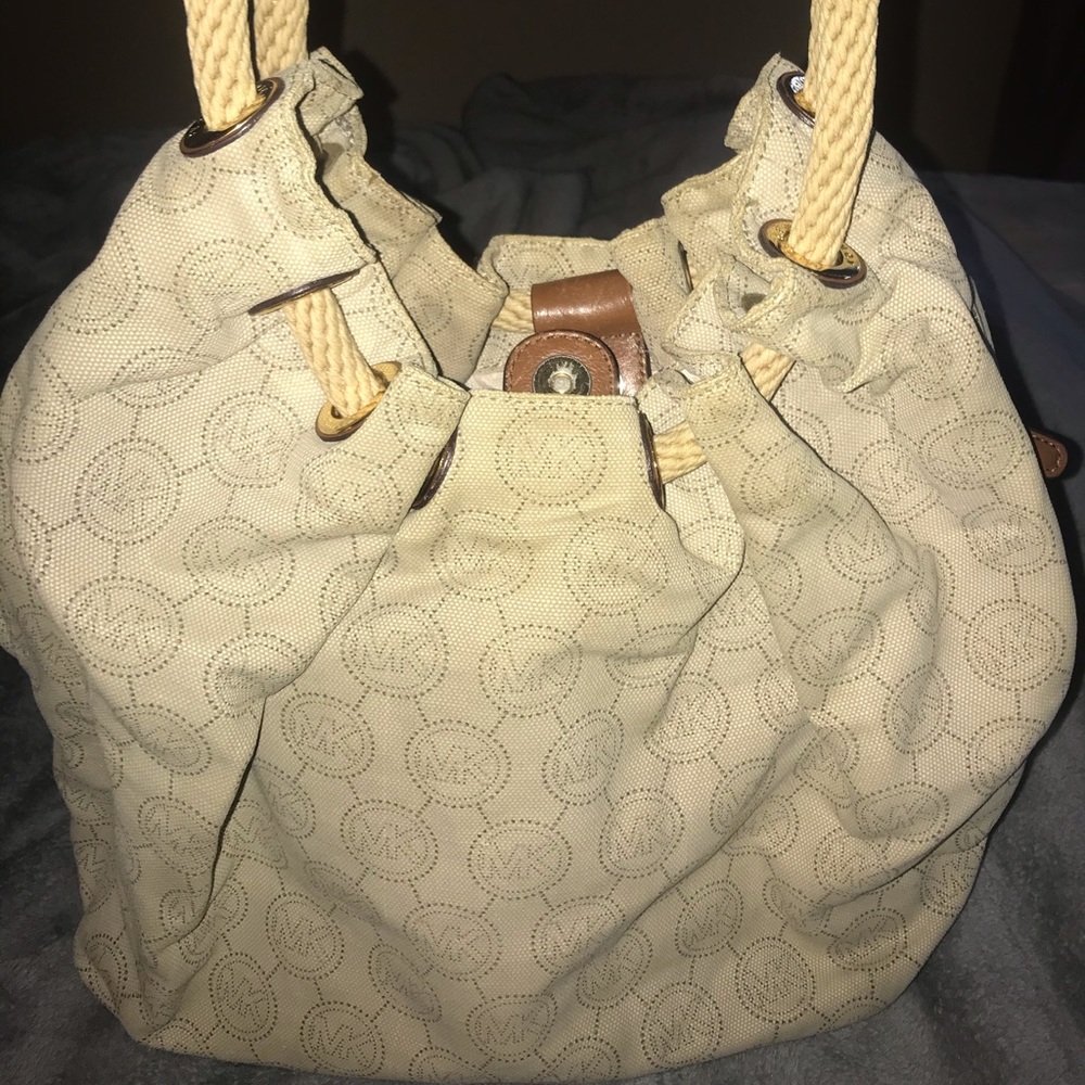 Michael Kors- MK monogram purse- Woven straps
